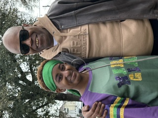 Sean Johnson with a young community member